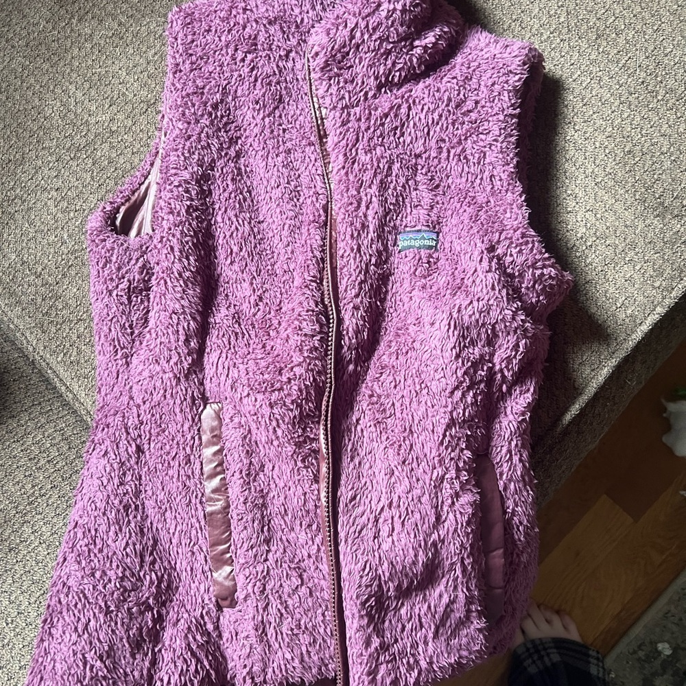 Reversible vintage Patagonia purple vest. Worn- tag is faded-Size Small